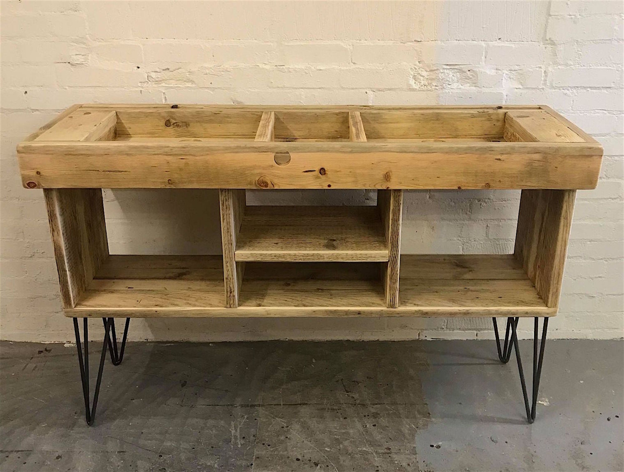 Rustic industrial DJ stand with deck and mixer compartments, on hairpin legs